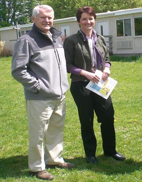 Blandford Nature Center’s director Annoesjka Steinman and Dr. Bill Laidlaw, grandfather of a BEEP, are pictured in front of the portable classroom that will be replaced by the new school.