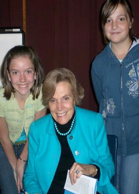 Dr. Sylvia Earle signs autographs for City High Middle School students Sherri Trumbell and Jenifer White.